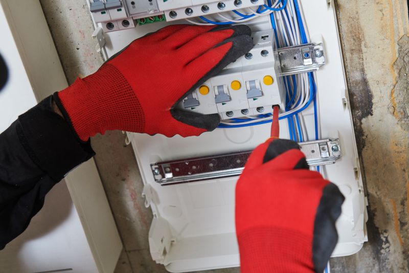 Electrician Repairing Circuit Breaker